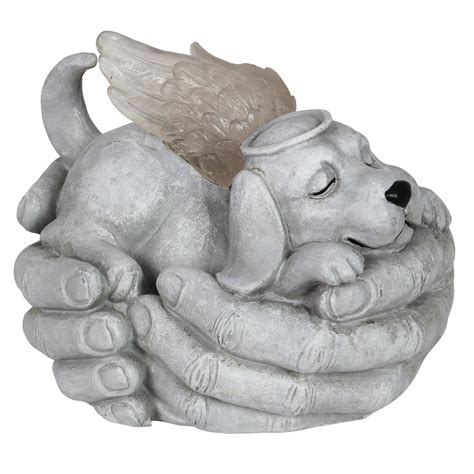 Pet angel - A candle urn with a sleeping cat or dog figurine. Light a candle in loving memory of your pet while preserving the ashes in this beautiful ceramic urn. Every urn is handmade and glazed in angelic white. Included is a colourful range of tealight candles to help and guide you through the grieving process.